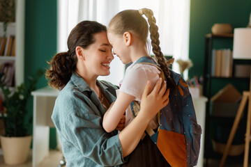 Happy family preparing for school
