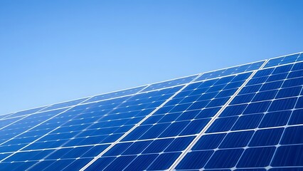 Solar panels under a clear blue sky, representing clean energy and sustainability.