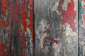 Red paint on old wooden wall with texture