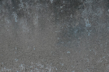 Grungy gray concrete wall texture with rain drops on the window surface and vintage aged cement pattern backdrop