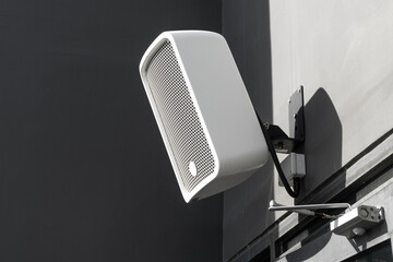 Outdoor Speaker System installed at balcony wall backyard exterior music audio system public park