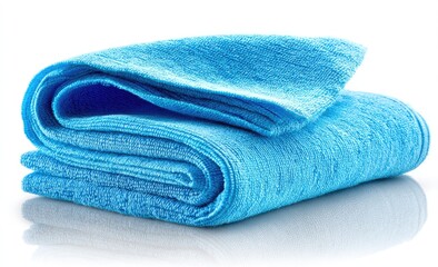Folded, vibrant blue towel on white background