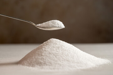 Spoon of sweetener. Sugar alternative, food and nutrition