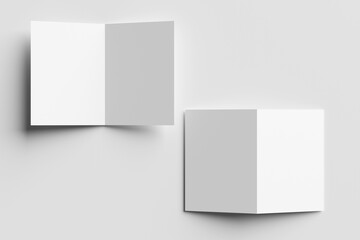 Bifold mockup. A pair of white bifold cards, one open and one closed, casting shadows isolated on a light grey background