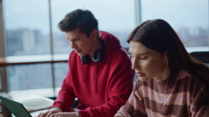 Two startupers giving five working on creative project at office closeup. 