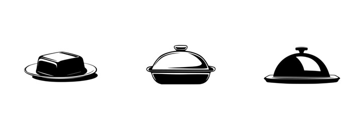 Elegant serving dishes displayed on a table, showcasing different styles of food presentation in a modern dining setting