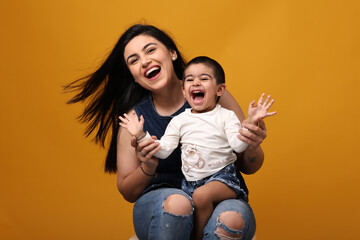Fototapeta premium Joyful Mother And Child Sharing A Playful Moment