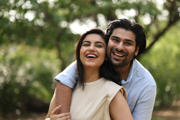 Fototapeta premium Couple Enjoying A Joyful Moment Outdoors In Nature