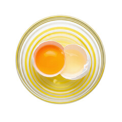 Cracked raw egg in a glass bowl