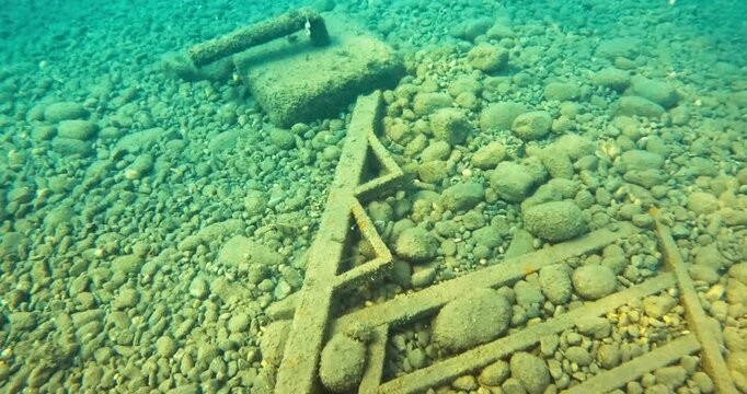 Sunken steel structure as an example of barbaric treatment of nature. 