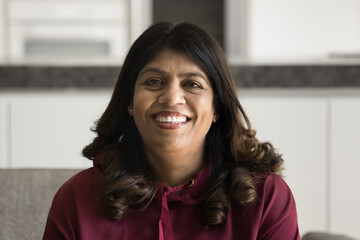 Timeless charm. Head shot portrait happy positive senior woman retiree looking at camera with bright healthy toothy smile feel joyful optimistic proud to be elegant stylish charismatic in retirement