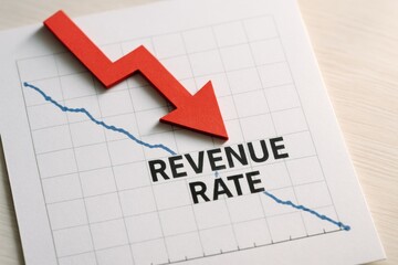 negative revenue rate concept. Declining revenue rate represented by a downward arrow on a graph.