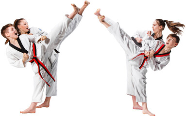 Boys and girls practicing synchronized taekwondo kicks during martial arts sparring drill. Concept of competitive sport, coordination, and dynamic martial arts action scenes. Transparent background. © master1305