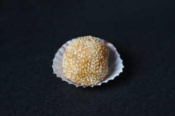 Traditional Sesame Ball Dessert on Dark Background