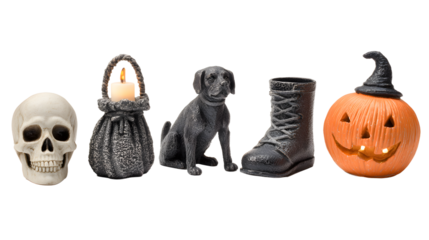 Halloween decorations including skull, candle lantern, black dog figurine, boot, and carved pumpkin with witch hat, perfect for spooky holiday themes