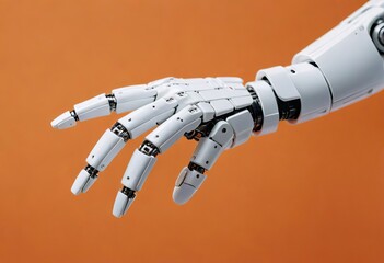 A technological robot arm on an orange background  