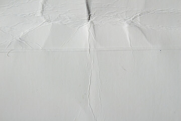 Obraz premium White creased paper background texture, backdrop design element