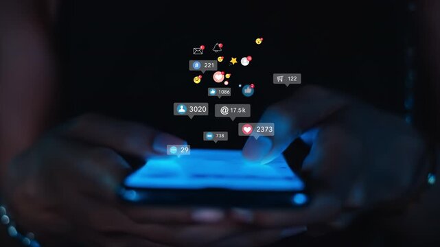 Close-up of hands using a smartphone with glowing screen, surrounded by floating social media icons, likes, followers, and notifications. Concept of digital lifestyle, online communication, ai