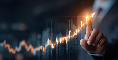 A hand points to a rising graph over cityscapes