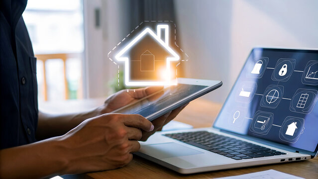 Man managing smart home devices through tablet and laptop interface, visualizing future living.