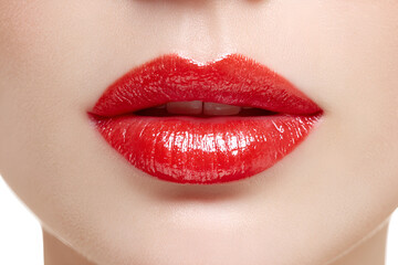 Fototapeta premium Closeup of glossy red lips beauty makeup