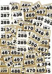 Obraz premium A montage of vintage raffle tickets in sepia.