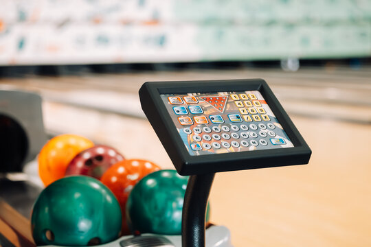 Brightly coloured keypad for scoring at bowling alley