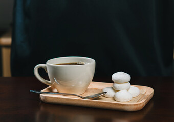 Delicious homemade black coffee with marshmallow. A delightful and indulgent treat