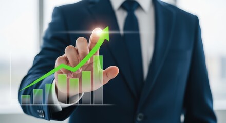Businessman touching a rising green graph indicating business growth