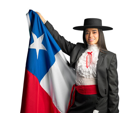 Chilean woman proudly displays the chilean flag while wearing traditional huasa attire, national holiday celebration 