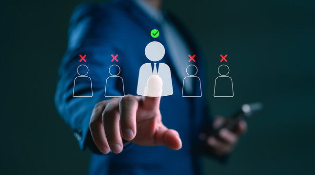 Businessman selecting candidate for recruitment with virtual interface, showing HR decision process, hiring strategy, talent selection and digital human resource management for workforce optimization.