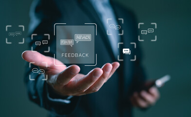 Businessman showing digital feedback interface with chat bubble icons, representing customer comment, online response system, user communication, and interactive review for business improvement.