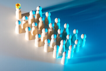 Business leader leads team. Figures of people follow leader in crown. Managing team of employees....