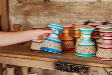 Tourist Holding Handmade Pottery Souvenir in Saudi Arabia