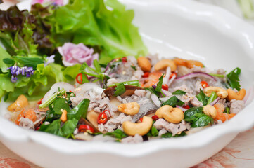 spicy salad or noodles salad, Thai spicy salad or vermicelli and minced pork salad