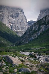 Captivating Mountain Valley Vista in Gannan China with Limestone Cliffs and Alpine Stream