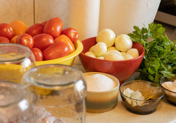 fresh tomatoes in a glass bowl close-up of the ingredients needed to can tomatoes