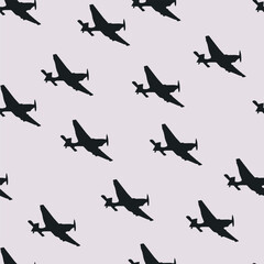 
Seamless background with silhouettes of military aircraft flying on a light beige background. Vector illustration for your designs and backgrounds in military style