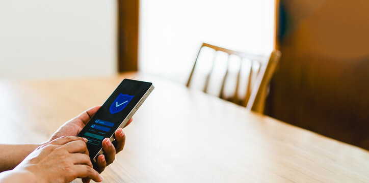 Smartphone with security login interface, showing shield icon and password access screen, symbolizing digital protection, privacy, and safe technology