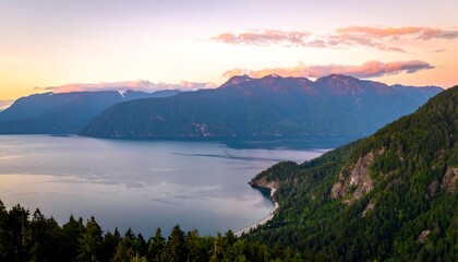 Obraz premium Mountain lake vista at sunset