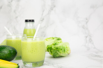 fresh avocado smoothie with green cos salad,  healthy drink concept