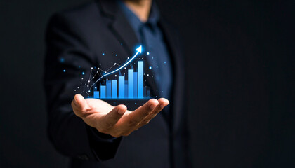 Businessman holding rising bar chart with glowing arrows. Concept for business growth, financial success, profit increase, investment strategy, stock market and data analytics