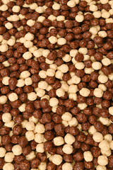 Chocolate corn flakes  as a background.