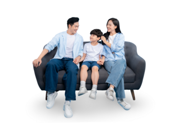 A happy family of three smiling together, sitting comfortably on a sofa on PNG 