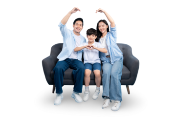 A family of three making heart shapes with their hands while sitting on a couch. They express love and warmth, representing familial bonds on PNG 