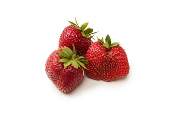 Fresh group of berries isolated on a white background.