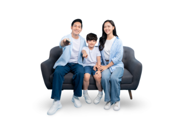 A family watching television on a couch together. The family looks happy and is relaxing indoors on PNG 