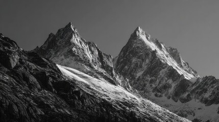 Rugged snow-capped peaks in alpine landscape