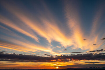 Dramatic sunset sky with rays of light