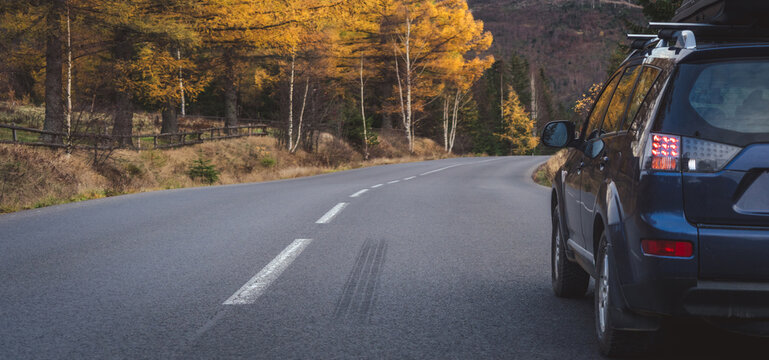 car for traveling with a mountain road